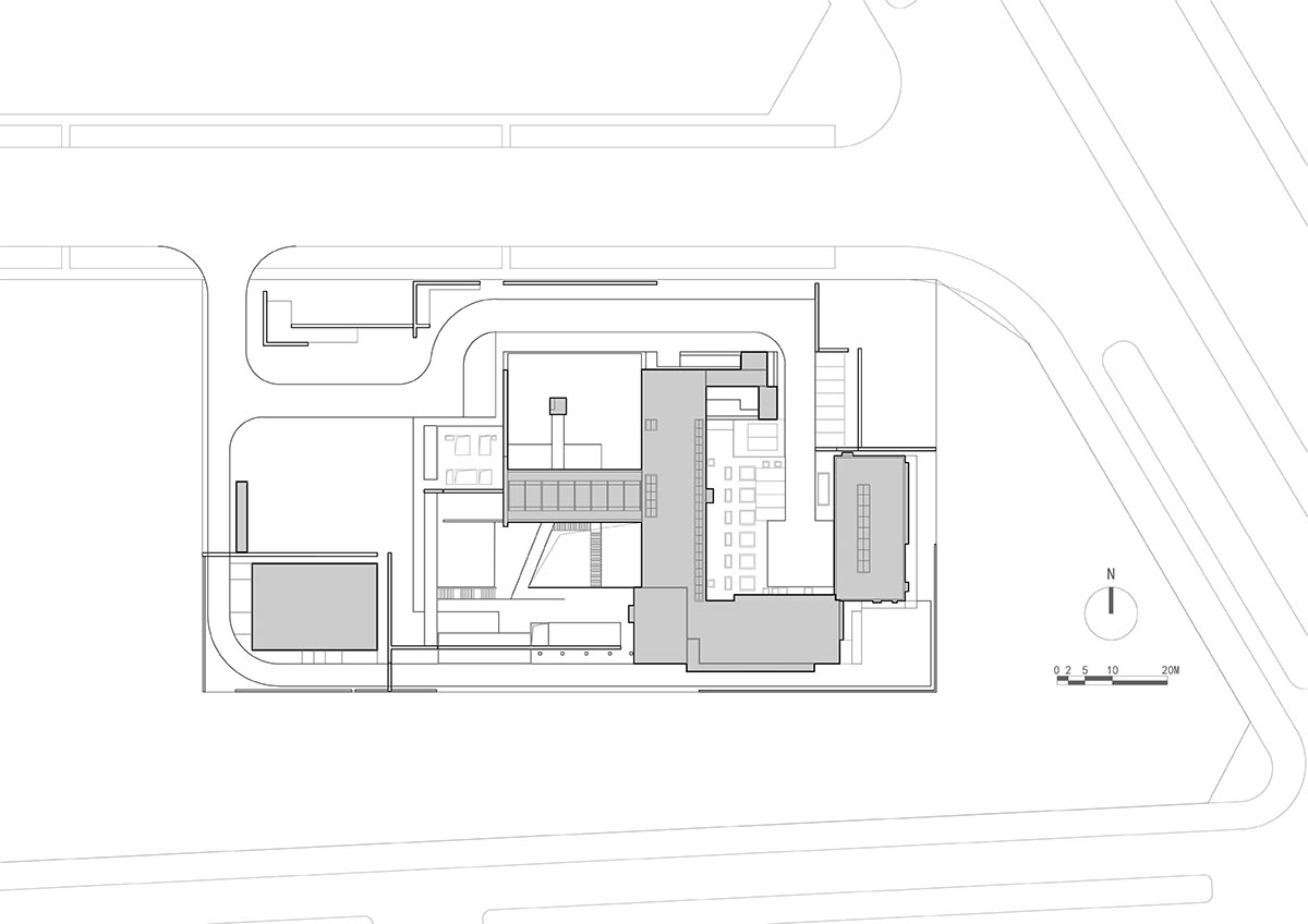Linear placement of earth-toned walls choreographs a serene hotel by Studio A+ in China 