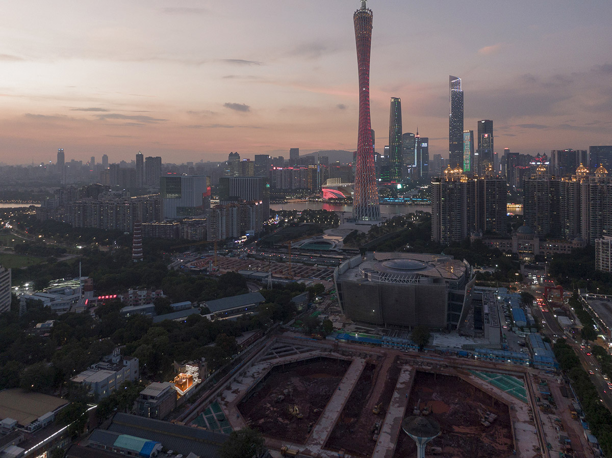 Wutopia Lab completes orange-colored vertical micro social complex with light tower in Guangzhou