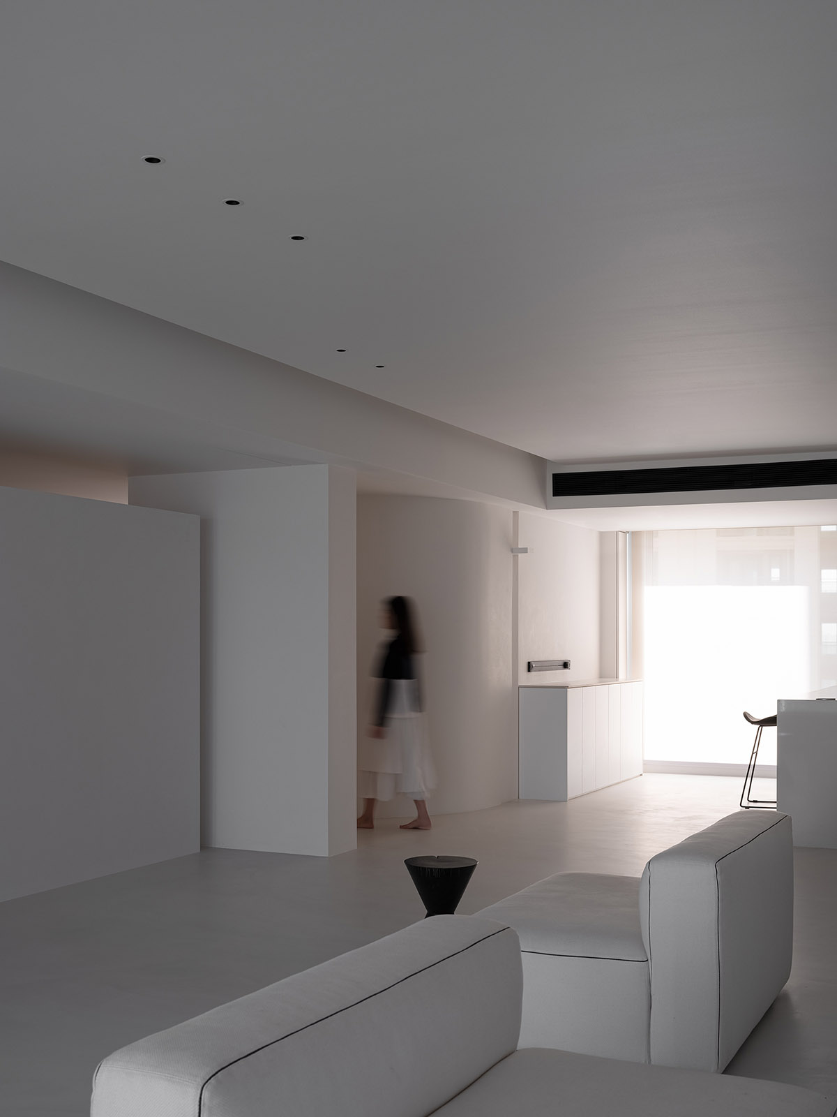 AD ARCHITECTURE creates all-white interiors with geometric compositions for L Apartment in China