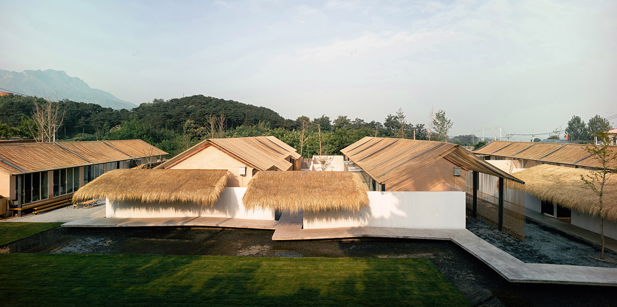 Domain Architects built boutique hotel with thatch roof and 60,000-metre hemp rope in rural Beijing
