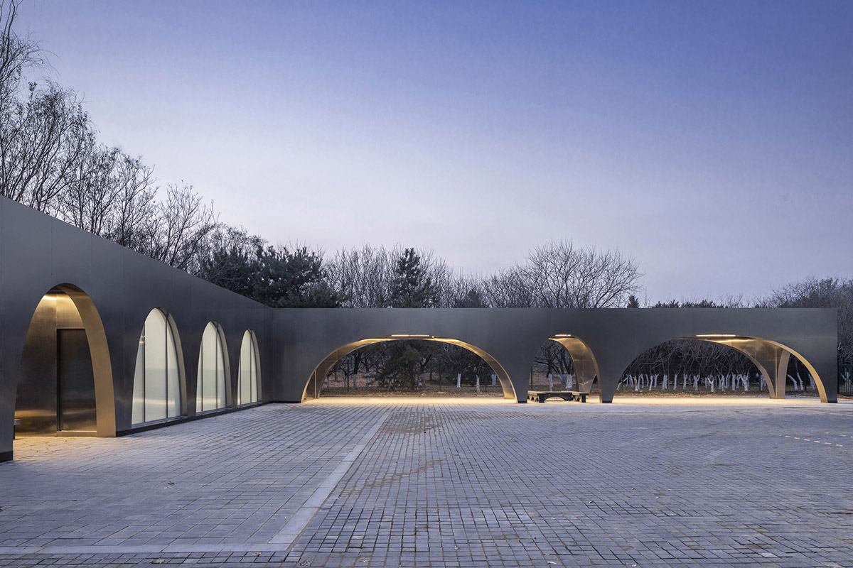 TEMP designs runner's station with stainless steel arcades in Beijing Olympic Forest Park