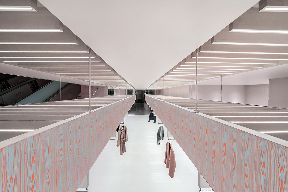 Various Associates creates show-like and pink-hued fashion store under a viaduct in Chongqing