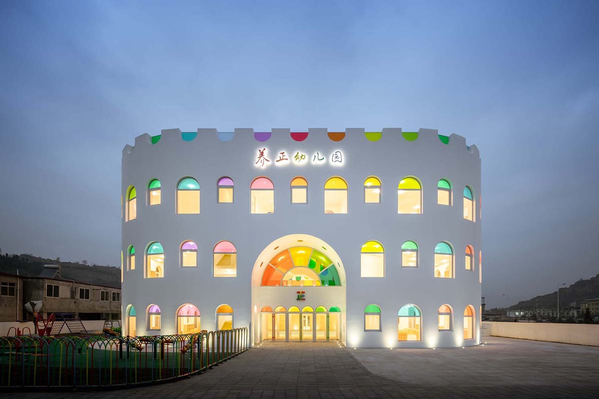 SAKO Architects designs colorful glass doors to evoke children's creativity in this school in China