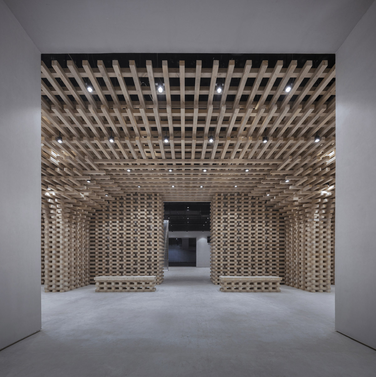 BANDe Architects combines greyscale interior with gridded wooden structures for GreenMonster Lab