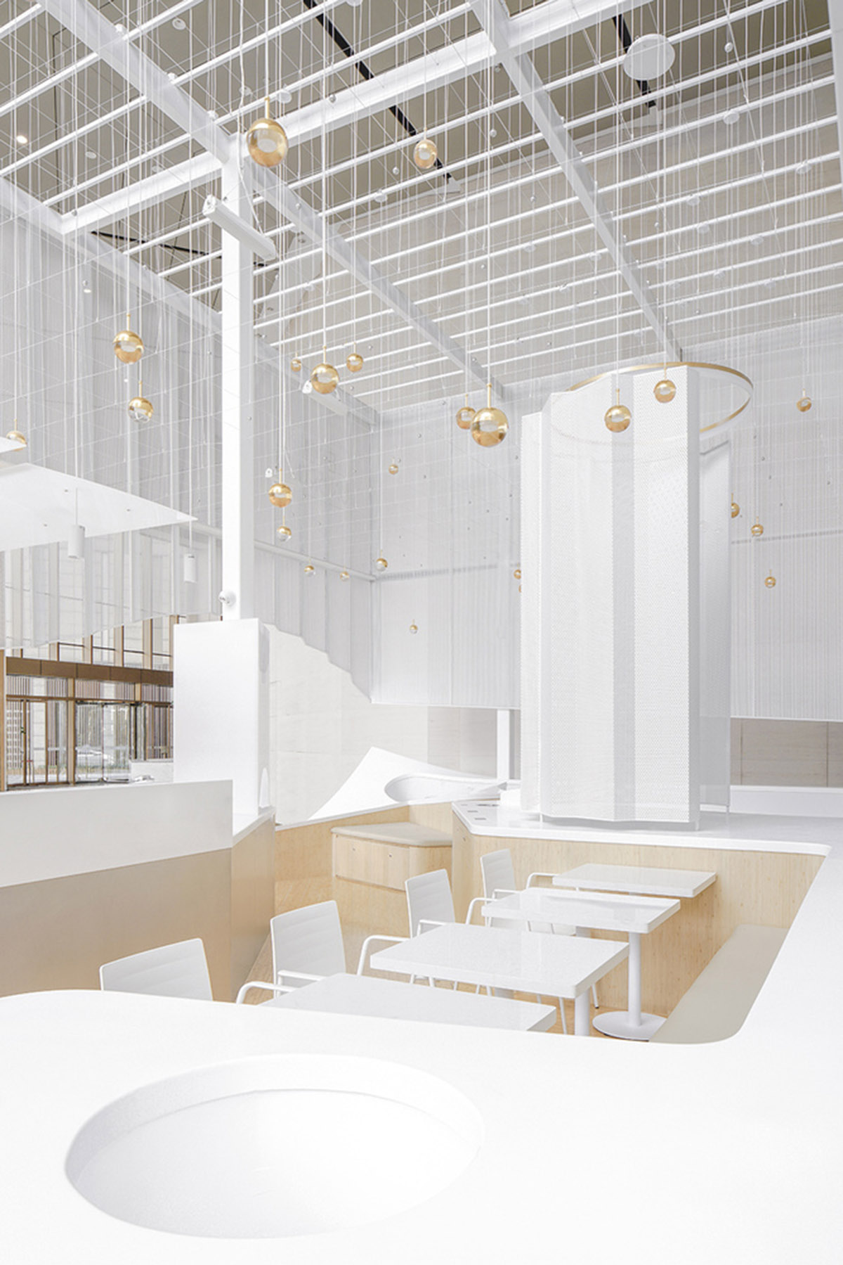 Mur Mur Lab uses all-white folded panels to create nature terrain for a coffee store in Shanghai