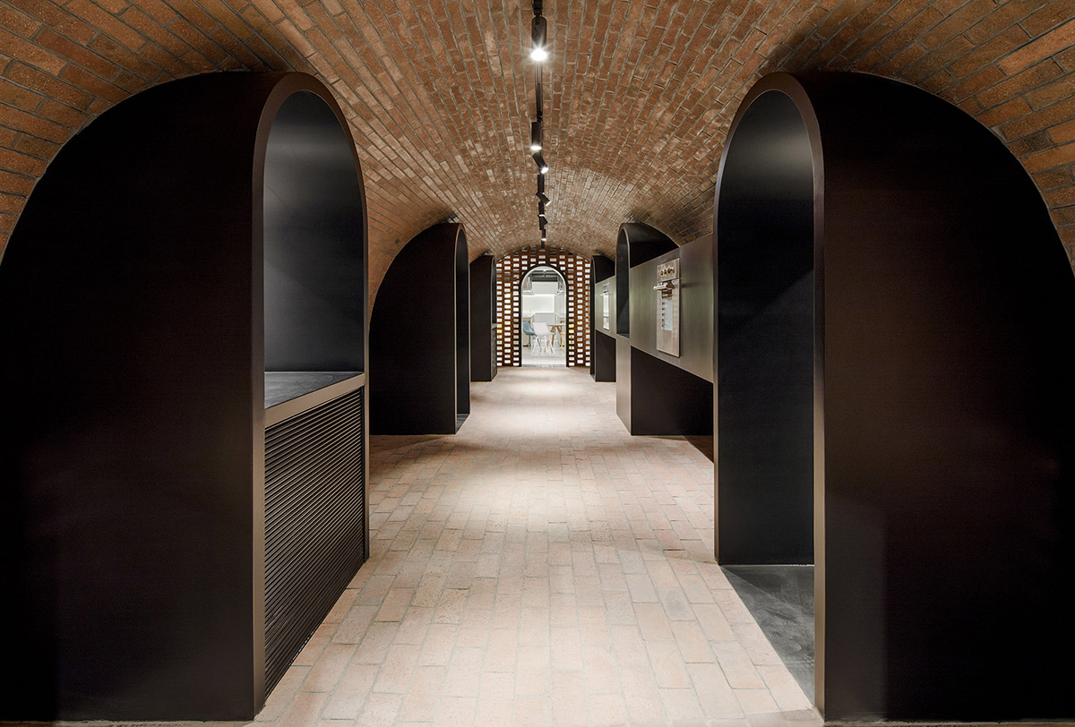 Lukstudio created artificial culinary village from different homes with monochrome interior