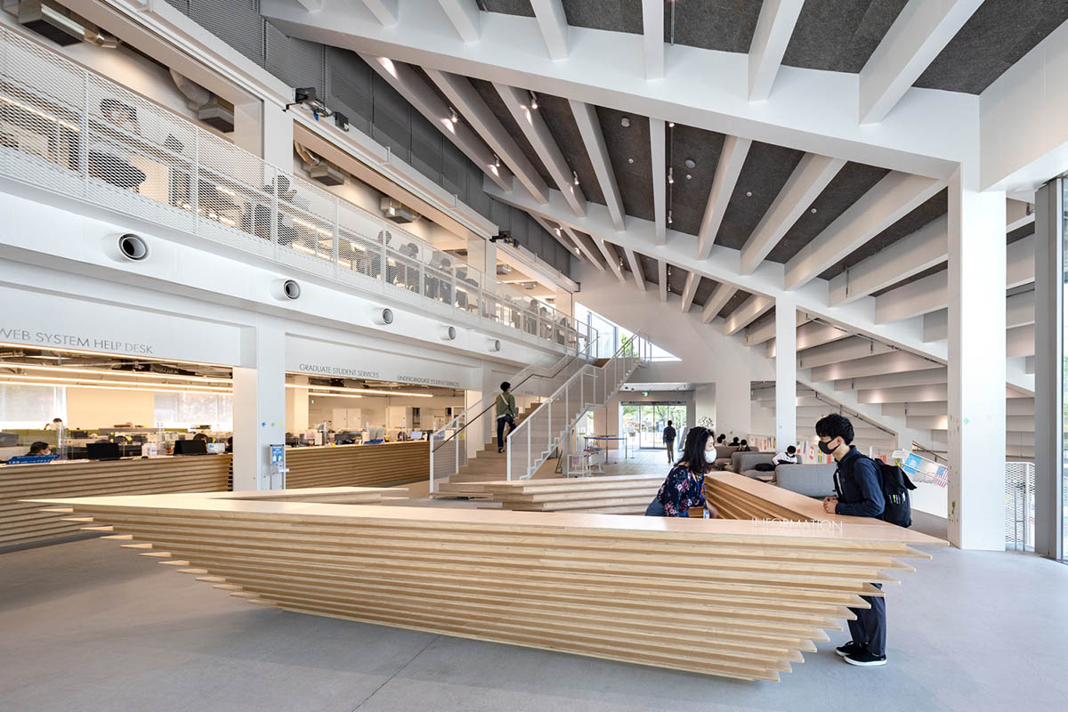 Kengo Kuma & Associates designs twisted student exchange hub featuring strip-like steps in Tokyo