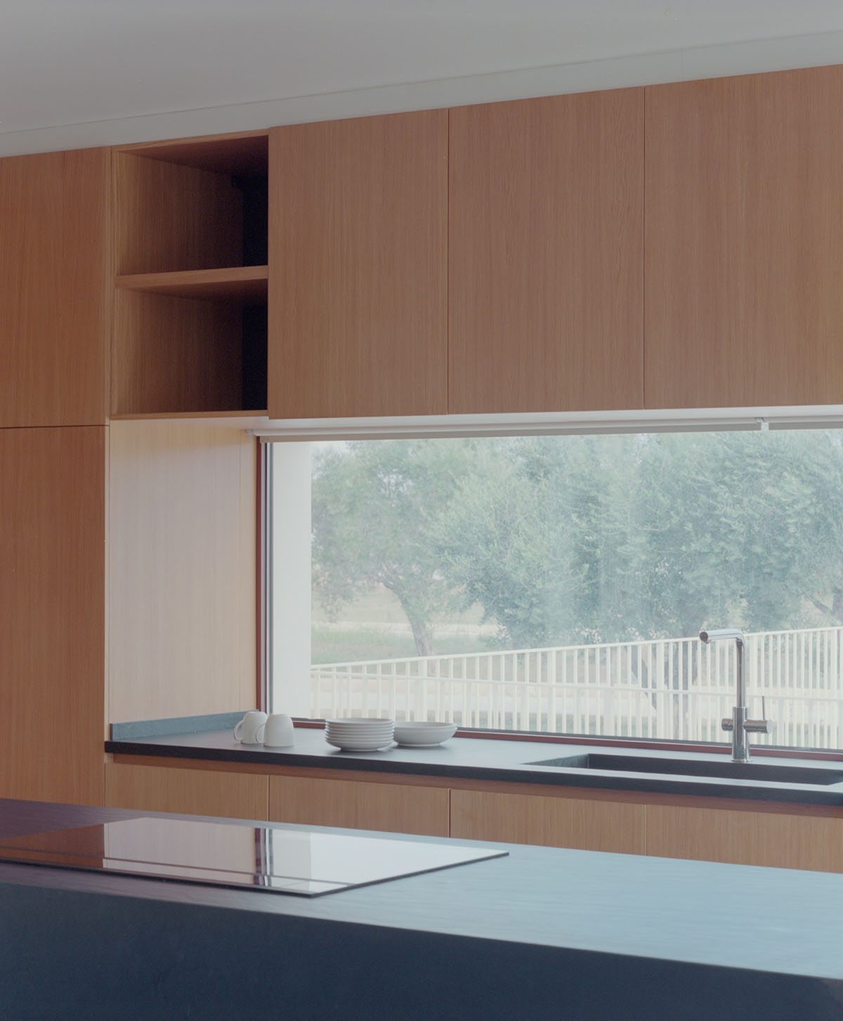 Rural retreat filters light through its stone porous screen in the Salento countryside