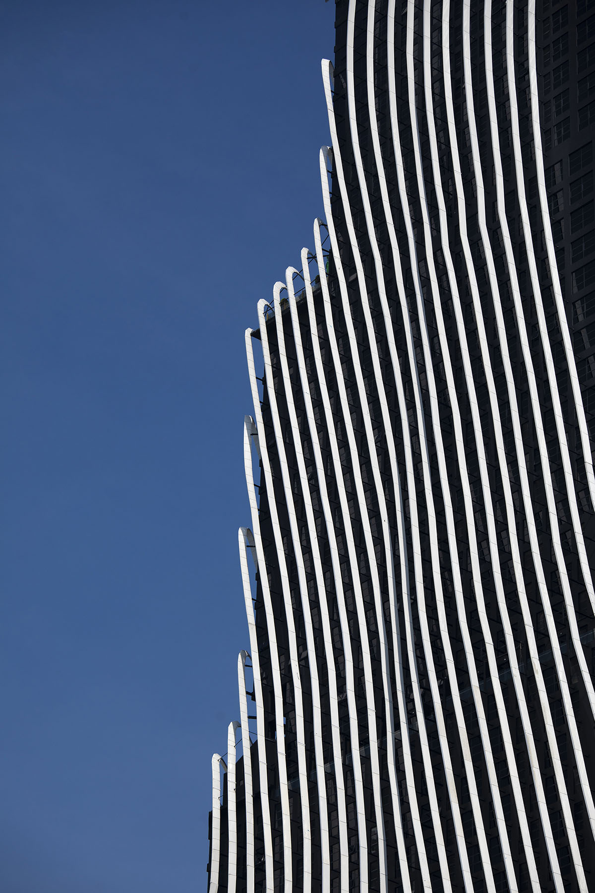 SPARK completes Art&eacute; MK towers in sculptured form wrapped by aluminum ribs in Kuala Lumpur