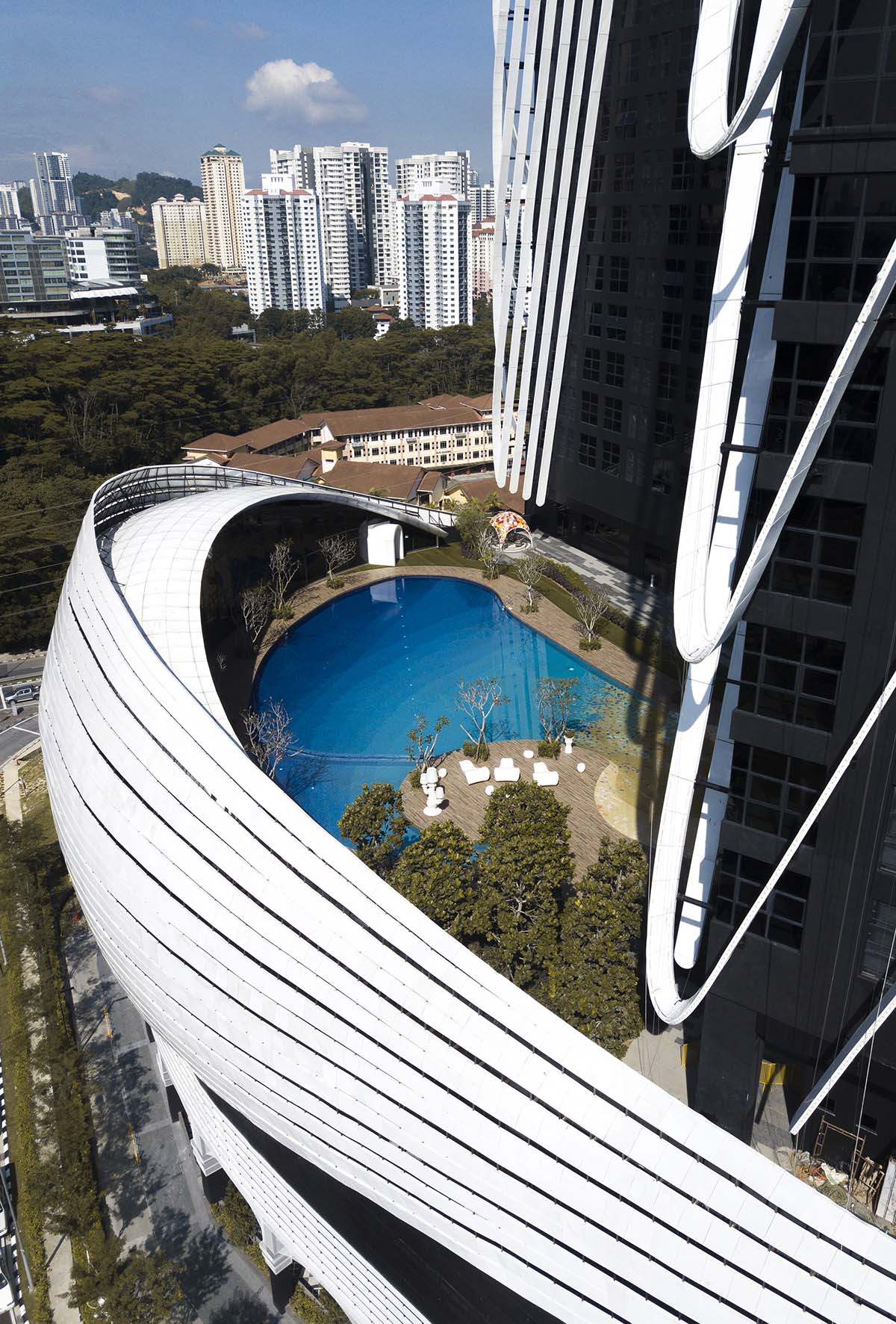 SPARK completes Art&eacute; MK towers in sculptured form wrapped by aluminum ribs in Kuala Lumpur