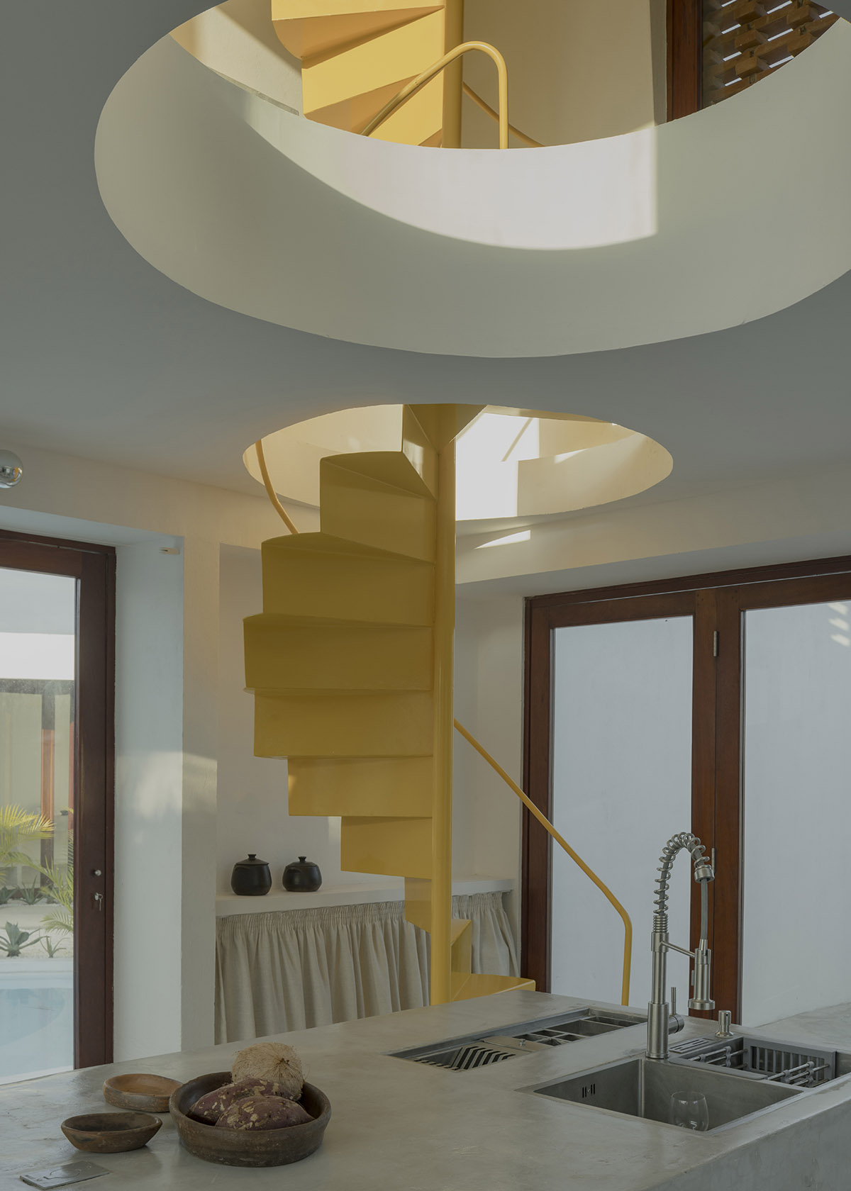 Atelier Matteo Arnone adds spacious brick tower to holiday home in Brazilian forest