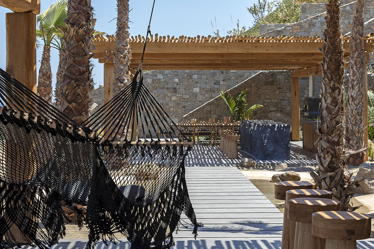 MK Design Studio designs luxurious holiday villa with creamy white walls and stone-walled terraces