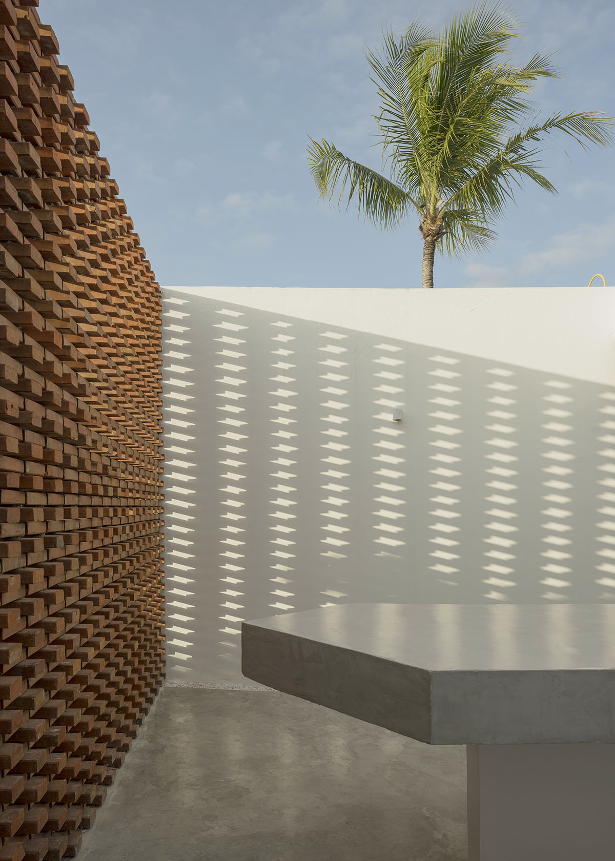 Atelier Matteo Arnone adds spacious brick tower to holiday home in Brazilian forest