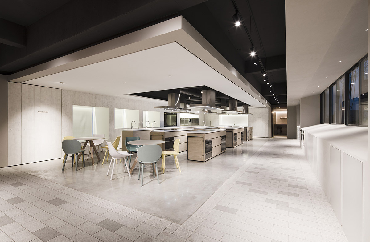 Lukstudio created artificial culinary village from different homes with monochrome interior