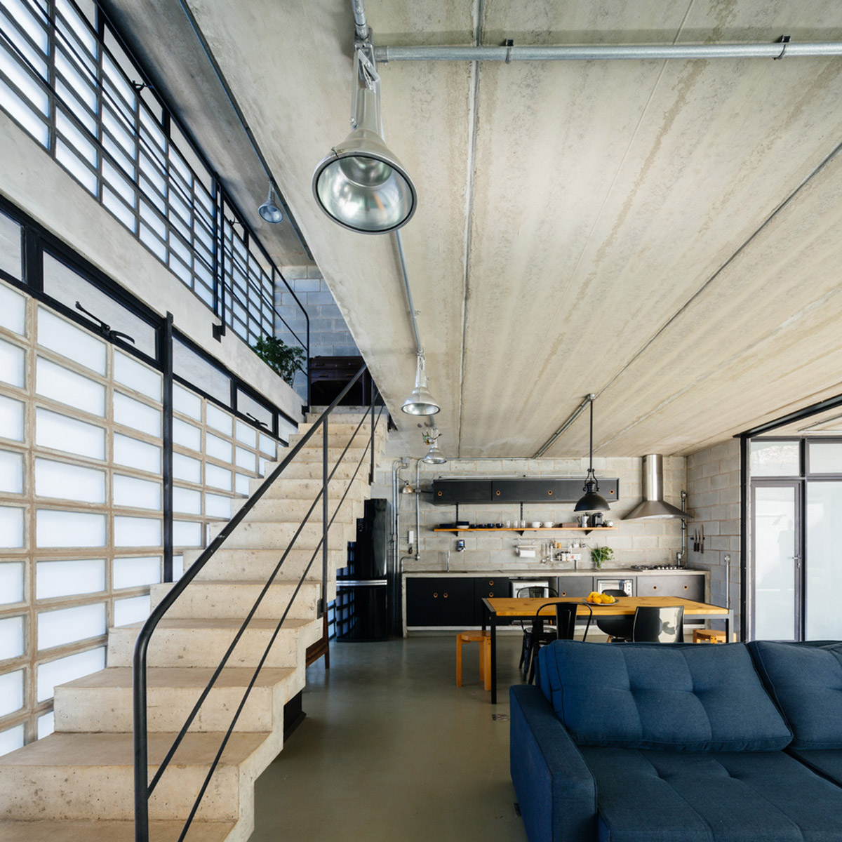 Terra e Tuma Arquitetos Associados completes Guaianaz House featuring perforated brick facade