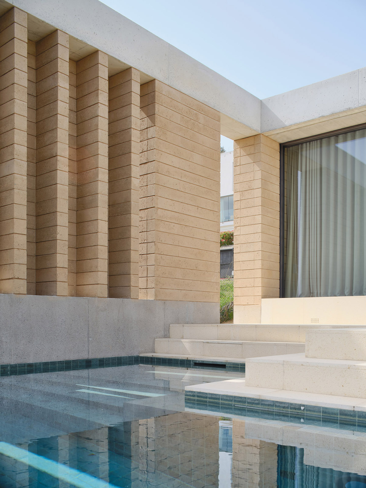 Atheleia Arquitectura completes Casa Artiga with rammed earth walls in Barcelona 