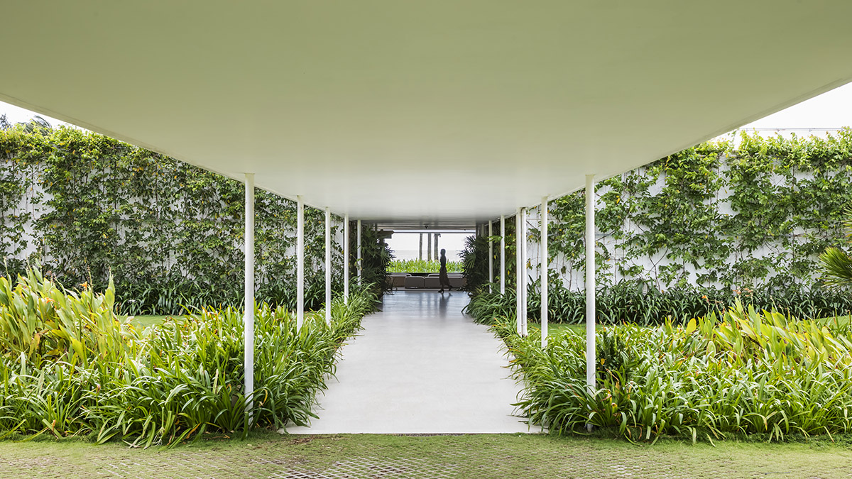 Six landscape boxes form this gallery and showroom by MIA Design Studio in Vietnam