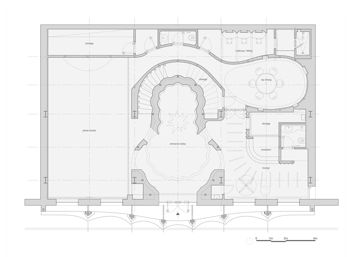123 architects converts industrial building into photography studio featuring arched addition