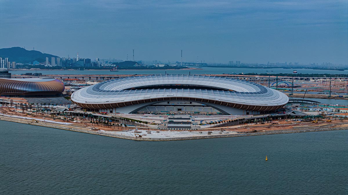 ZHA's Greater Bay Area Sports Centre, featuring distinctive layered roof, nears completion in China