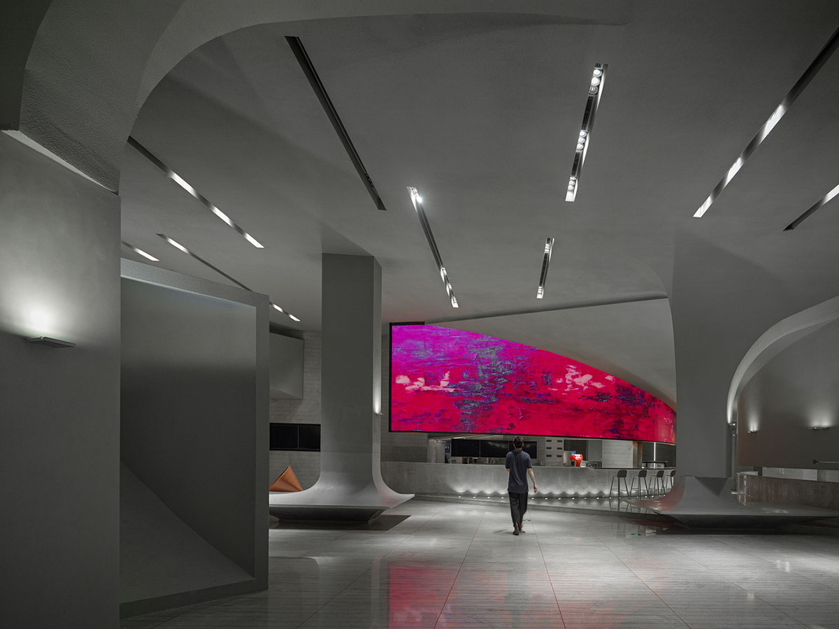 Greyscale interior provides acoustically comfortable space for a cinema by One Plus Partnership