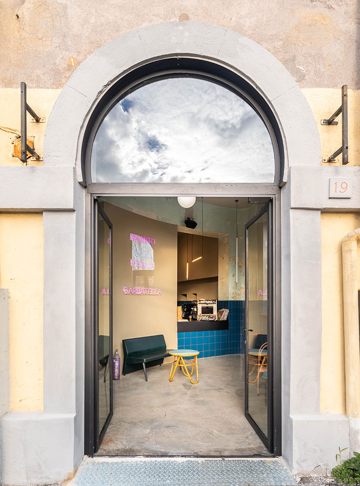 STUDIOTAMAT converts abandoned bakery into a colorful restaurant in Rome