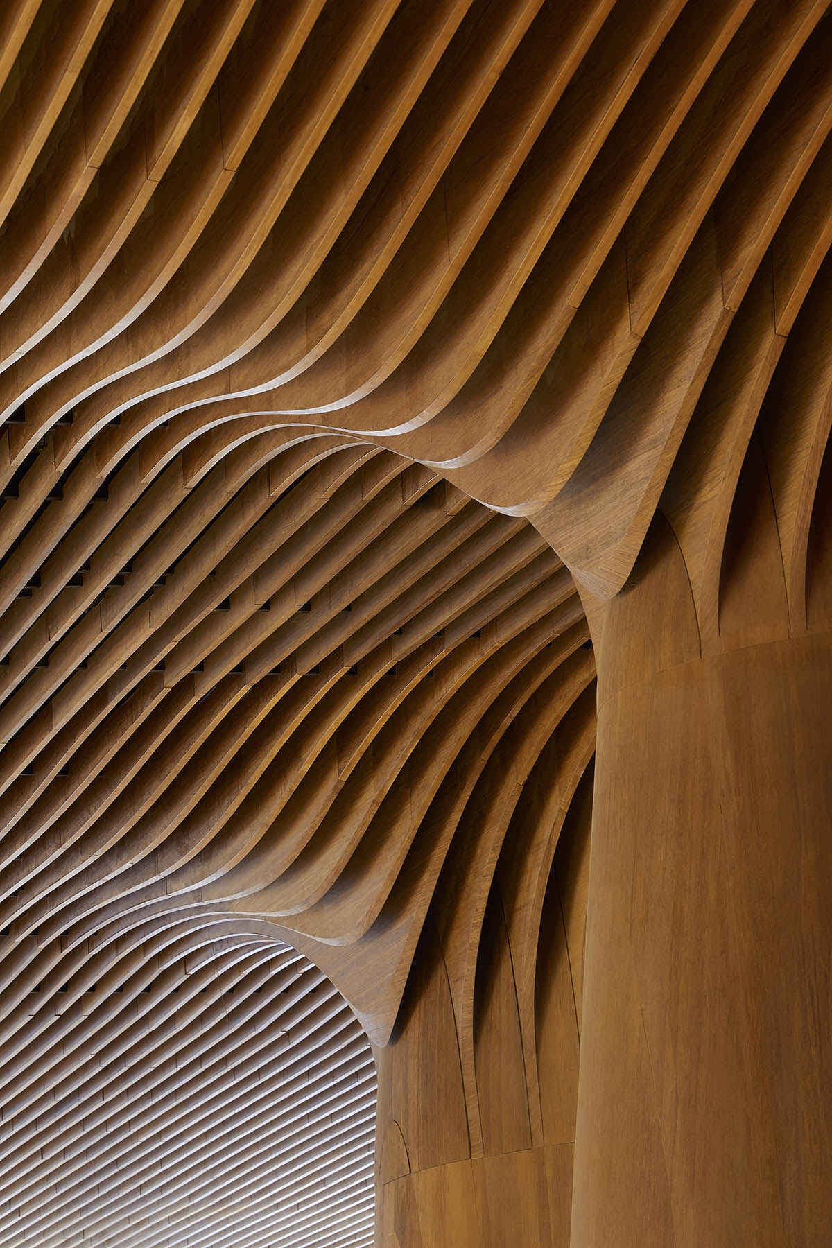 Zaha Hadid Architects' shopping complex made of engineered bamboo creates louvered surfaces