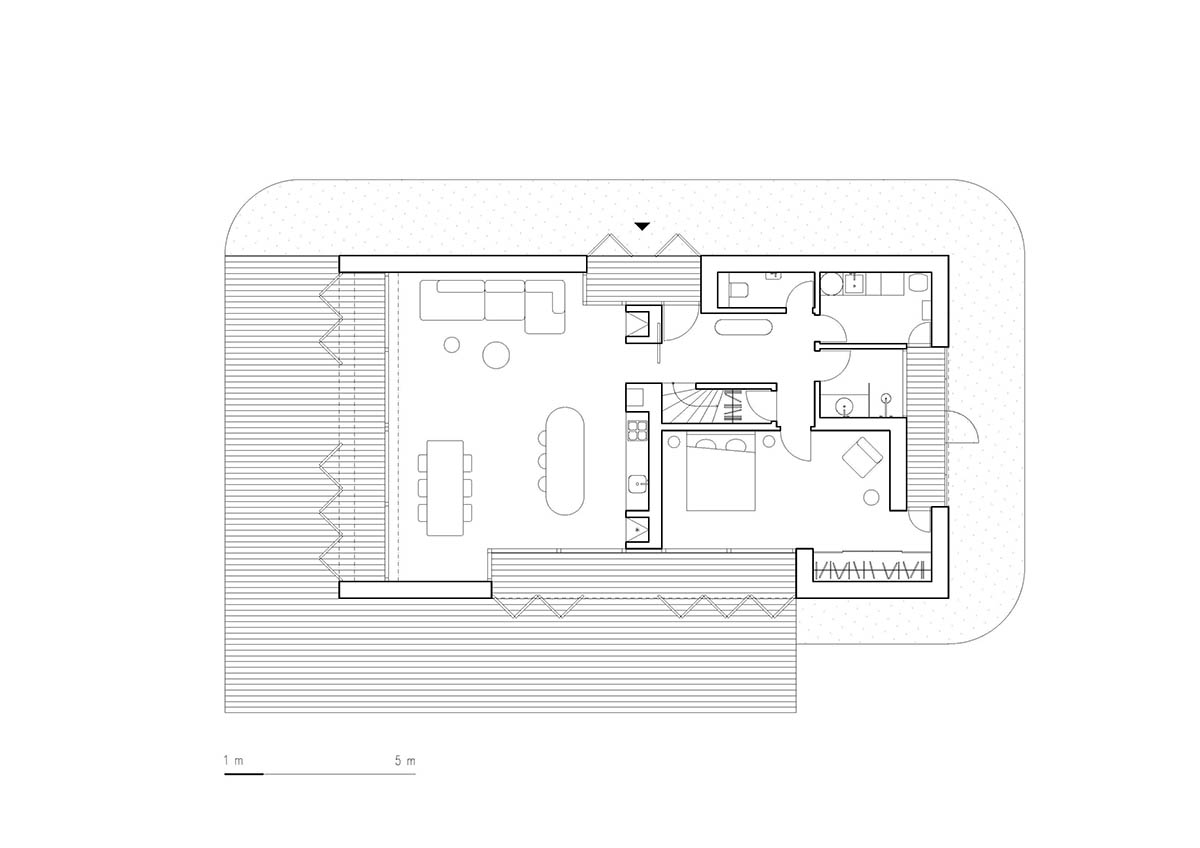 Jan Žaloudek Architekt converts a Baroque barn into a light-filled house with perforated gable wall
