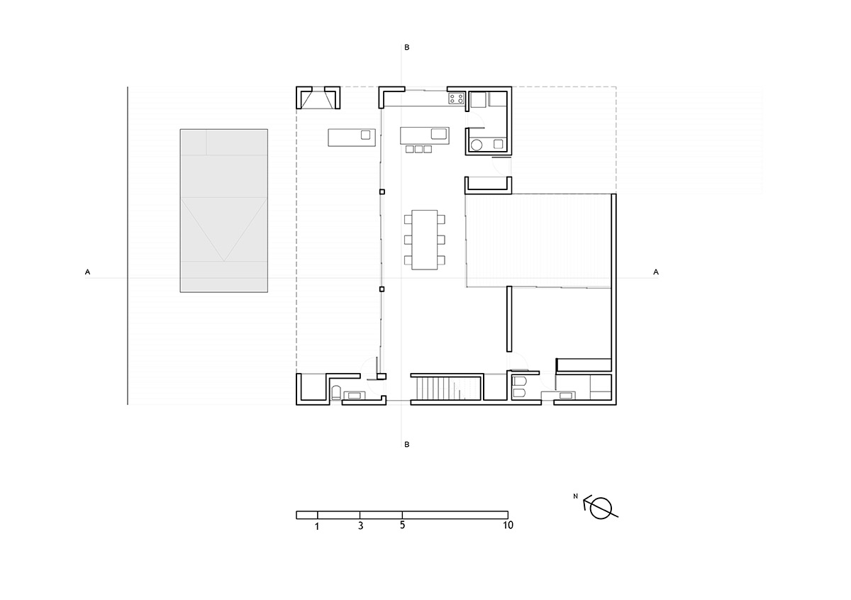 Además Arquitectura completes weekend house made from black corrugated metal sheets