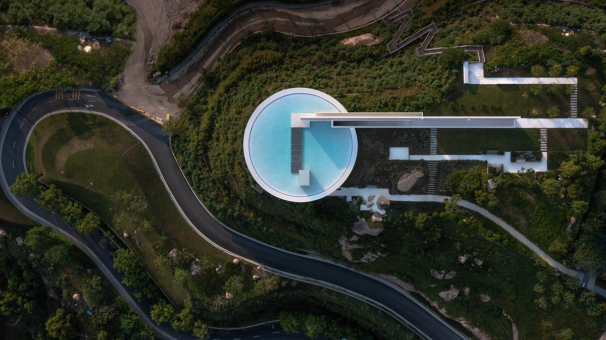 3andwich Design / He Wei Studio built circular library featuring a rooftop pool in China