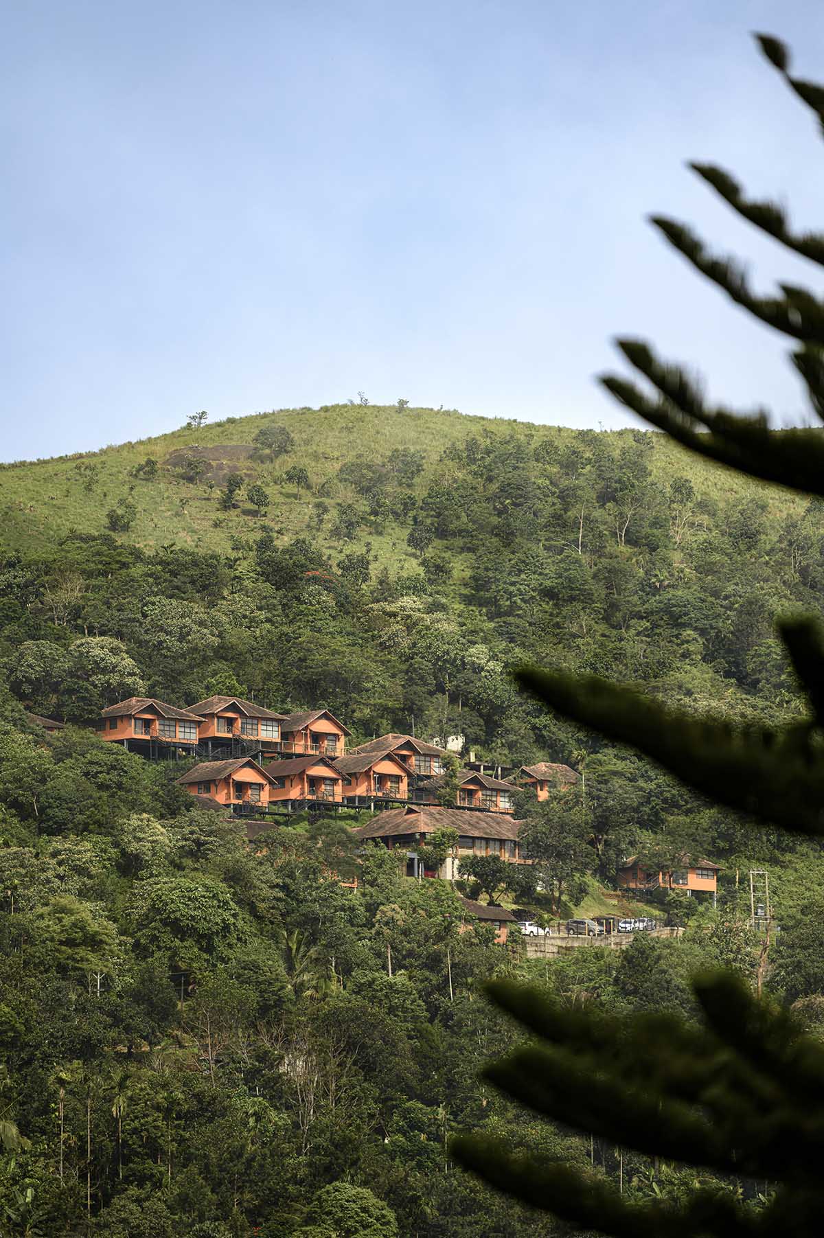 Srijit Srinivas - ARCHITECTS completes resort with dispersed villas in the hills of Idukki, India
