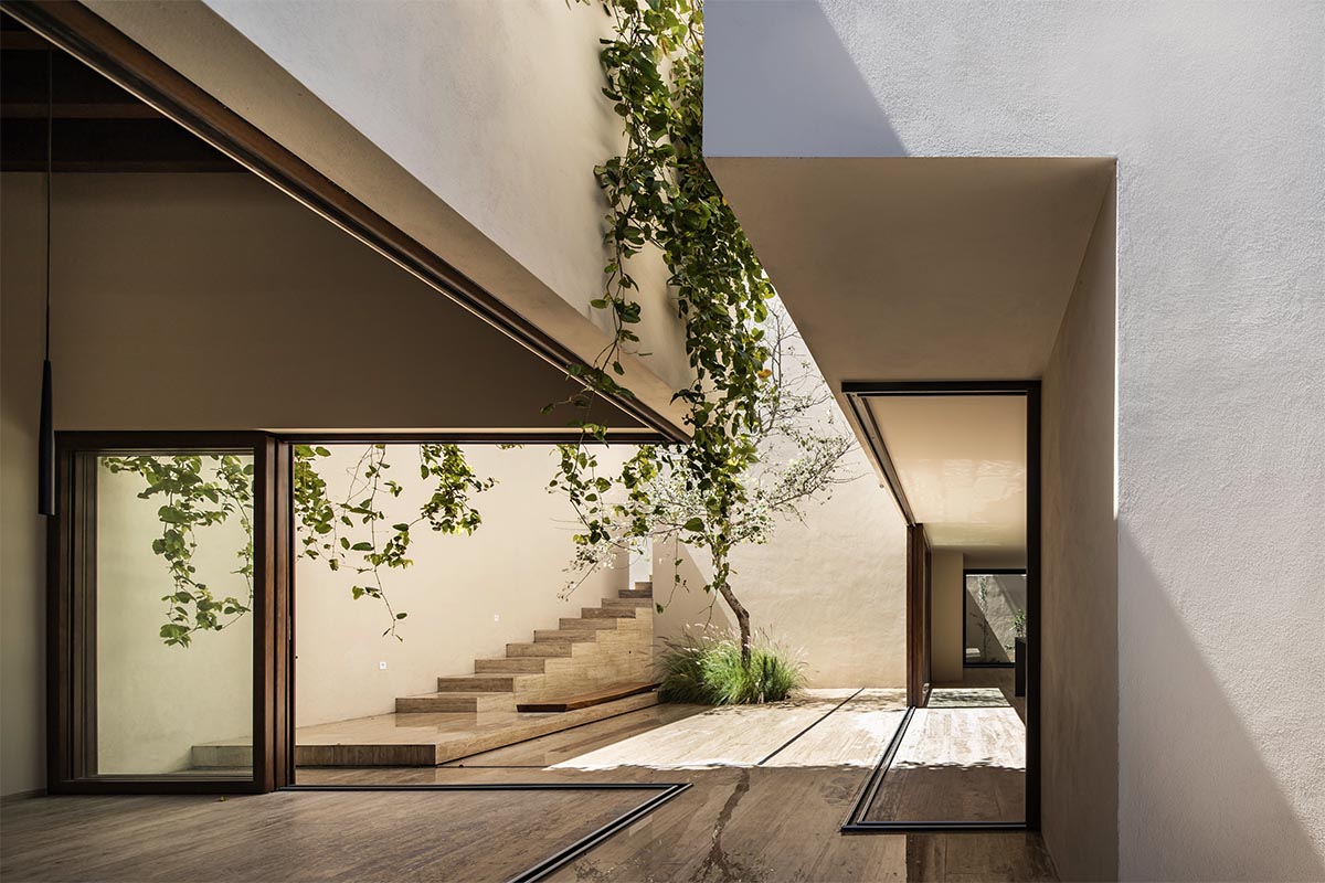 Sabino 10 residence by Editorial features a solid façade with hermetic volumes in Mexico
