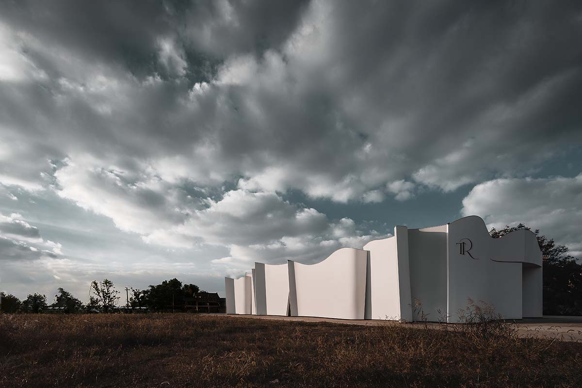 Chinese chapel creates a fluid silhouette featuring curving walls to mimic blossoming petals 