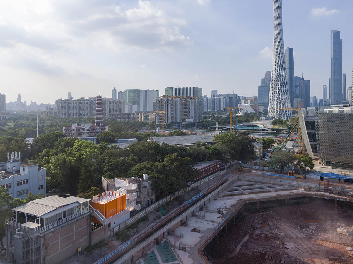 Wutopia Lab completes orange-colored vertical micro social complex with light tower in Guangzhou