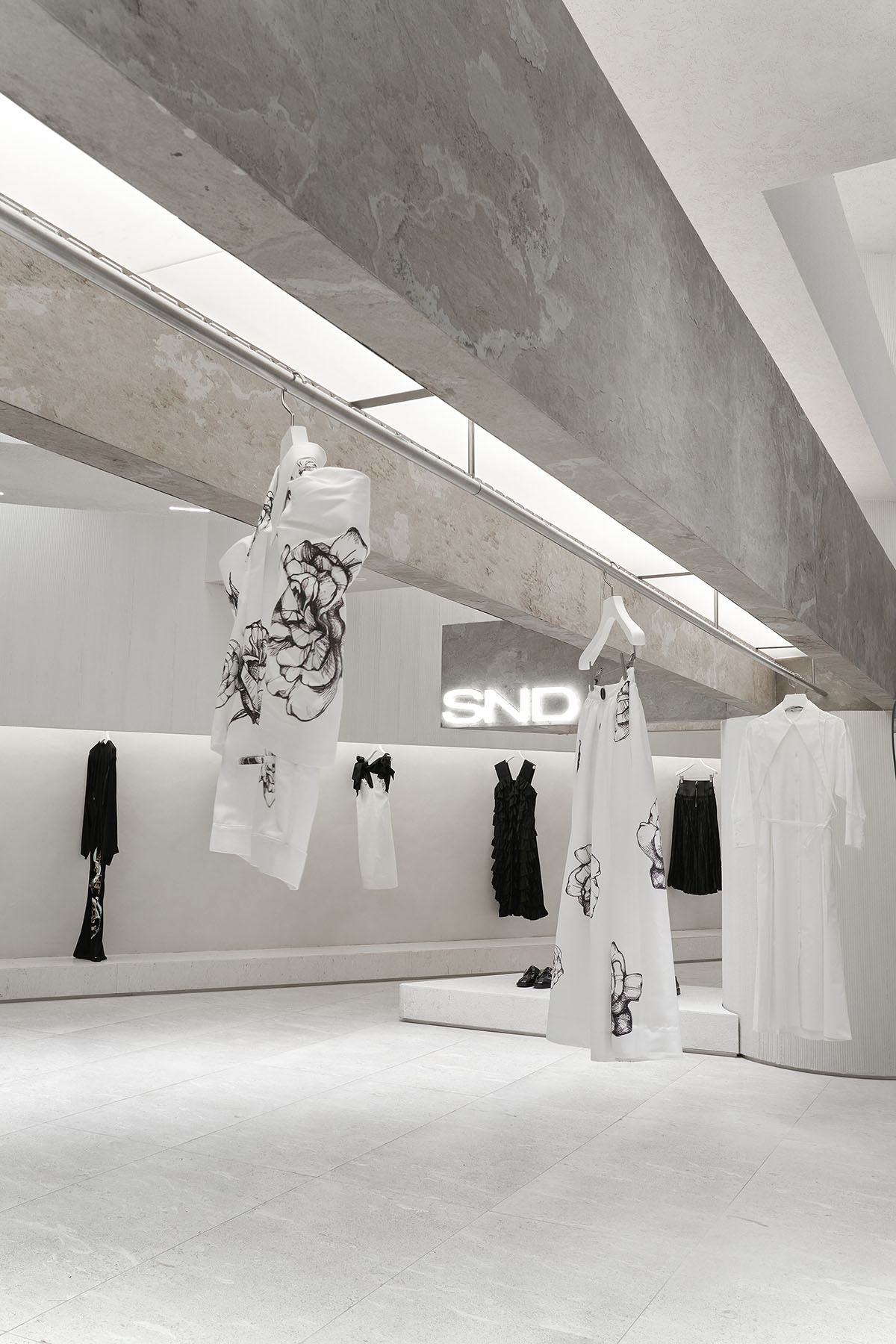 Boutique fashion store by Various Associates is inspired by remaining ancient temples in deserts