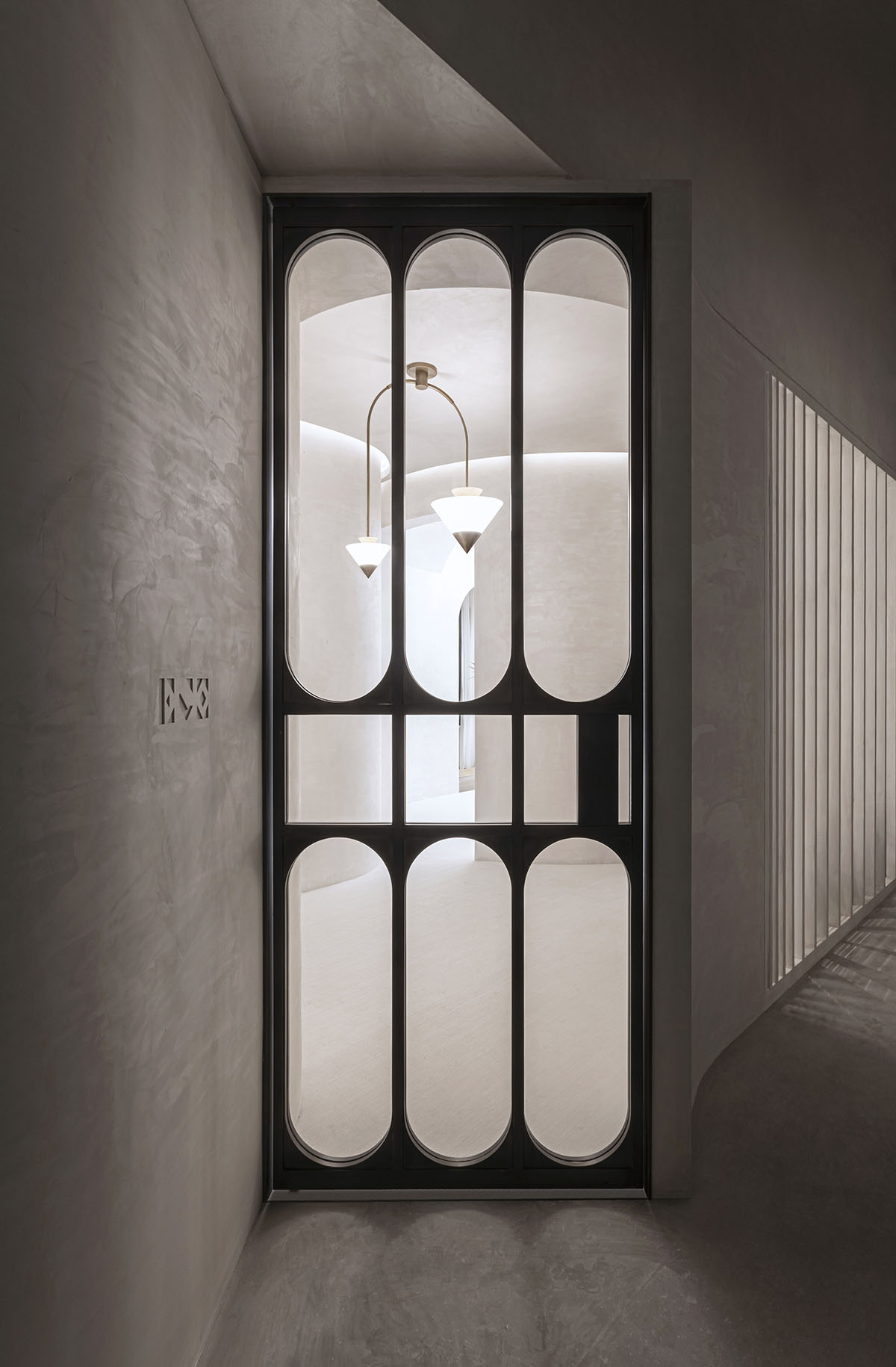 EVD designs its office that features classical aesthetics with arched elements in Shanghai