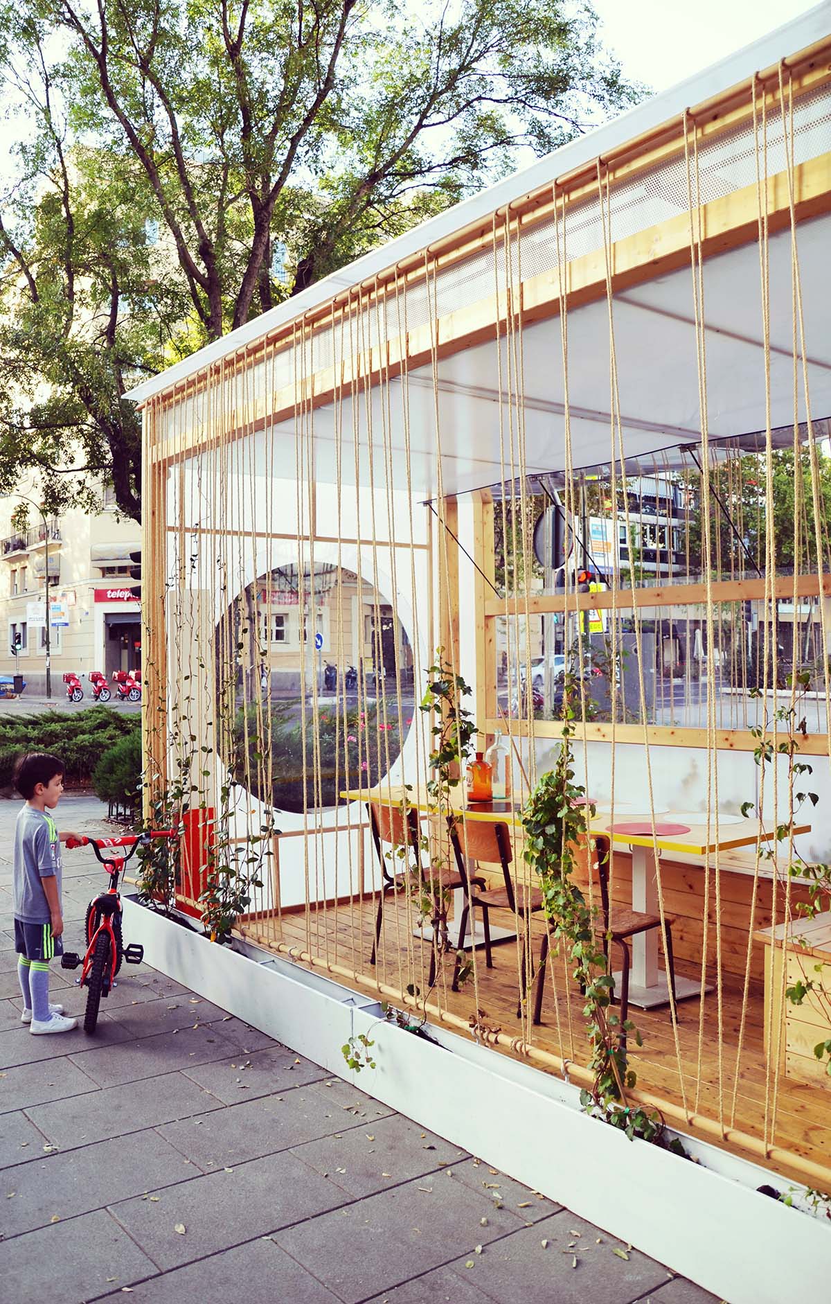 delaVegaCanolasso completes moveable urban pavilion with striped-facade in Madrid