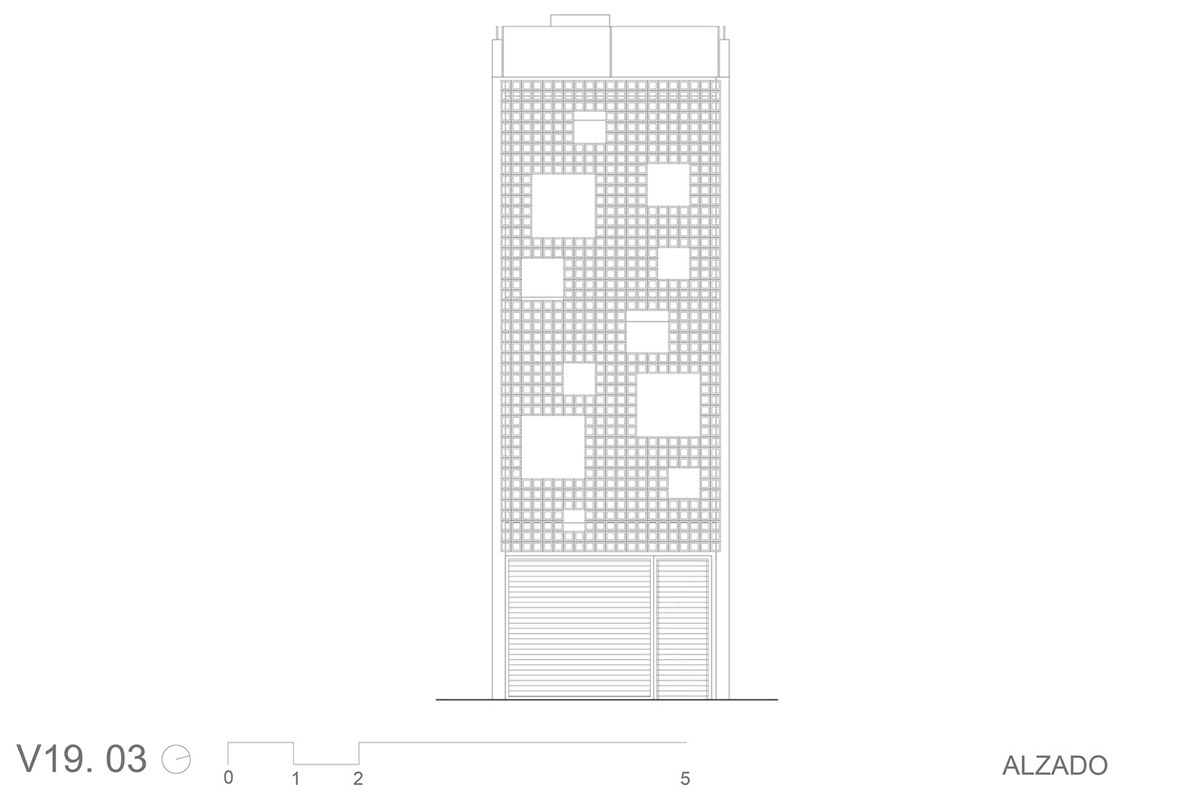 Viraje arquitectura creates perforated façade for elongated family house to play with natural light