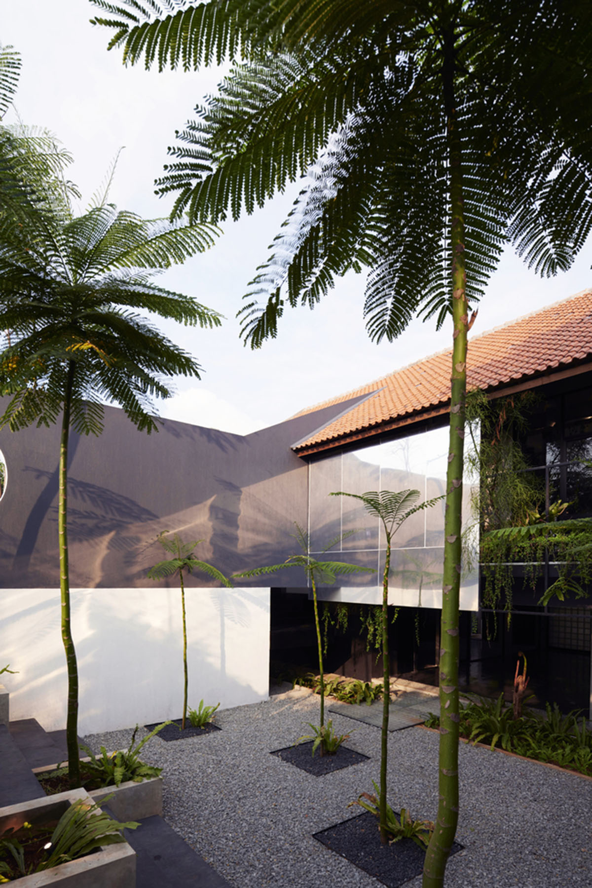 RAD+ar redesigns old vernacular building with tropical architecture as its main office in Jakarta