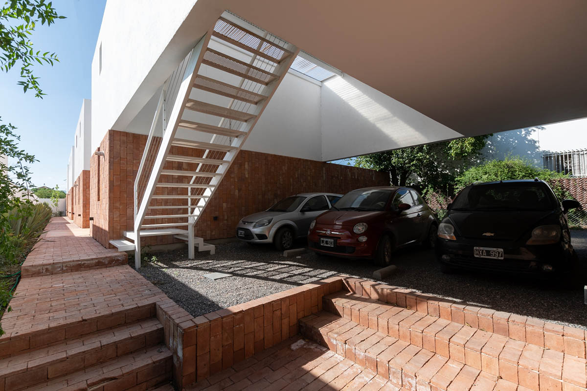 Andres Alonso Architecture Workshop completes La Inesita houses with tall brick base in Cordoba