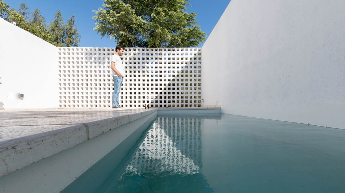 Andres Alonso Architecture Workshop completes La Inesita houses with tall brick base in Cordoba