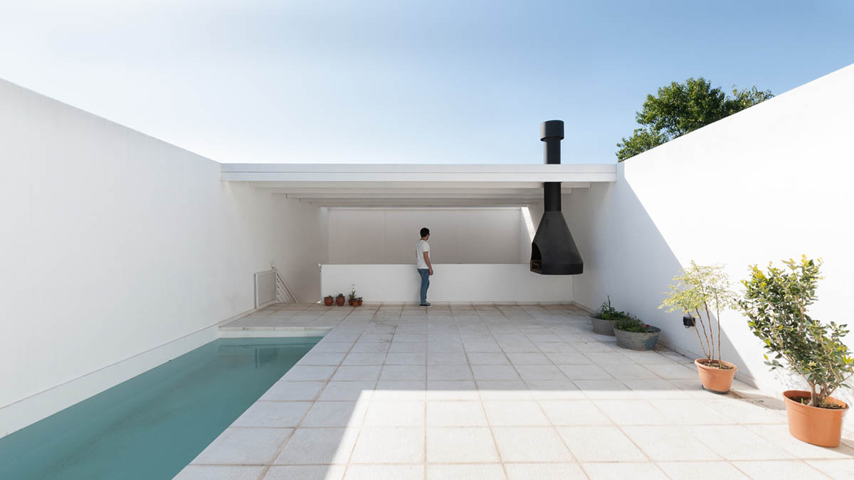 Andres Alonso Architecture Workshop completes La Inesita houses with tall brick base in Cordoba