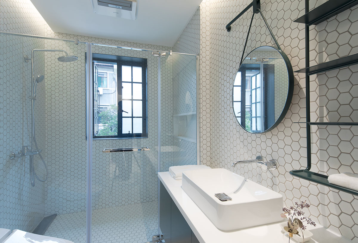 RIGI Design renovates Shanghai's historic house with punched holes and white colour palette