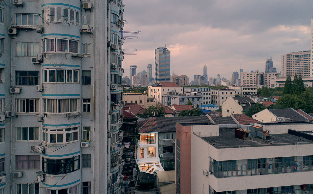 RIGI Design renovates Shanghai's historic house with punched holes and white colour palette