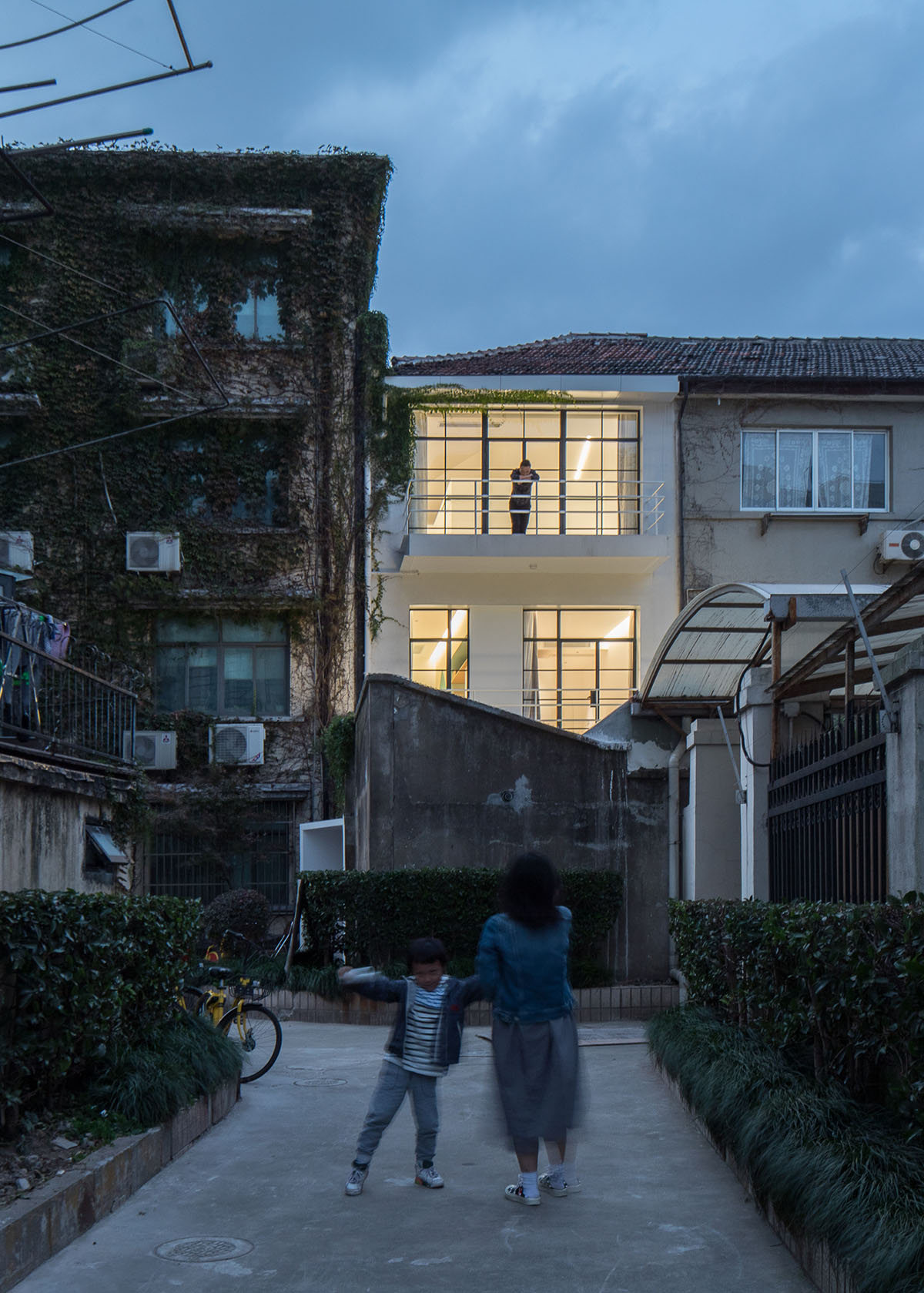 RIGI Design renovates Shanghai's historic house with punched holes and white colour palette