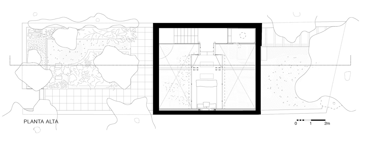 Pía Mendaro converts old house into an artist residence with floating mezzanine floor in Madrid