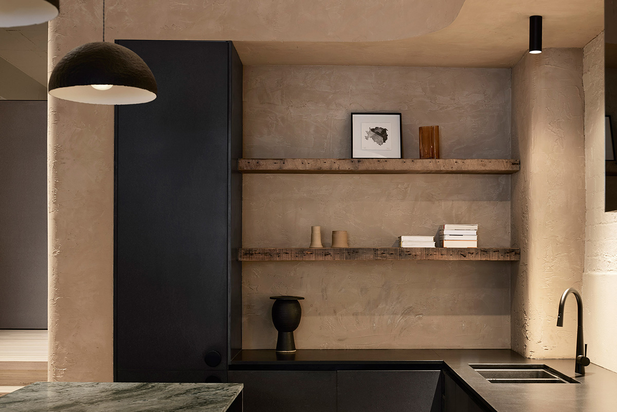 Splinter Society transforms former chocolate factory warehouse flat with earthy and rustic tones