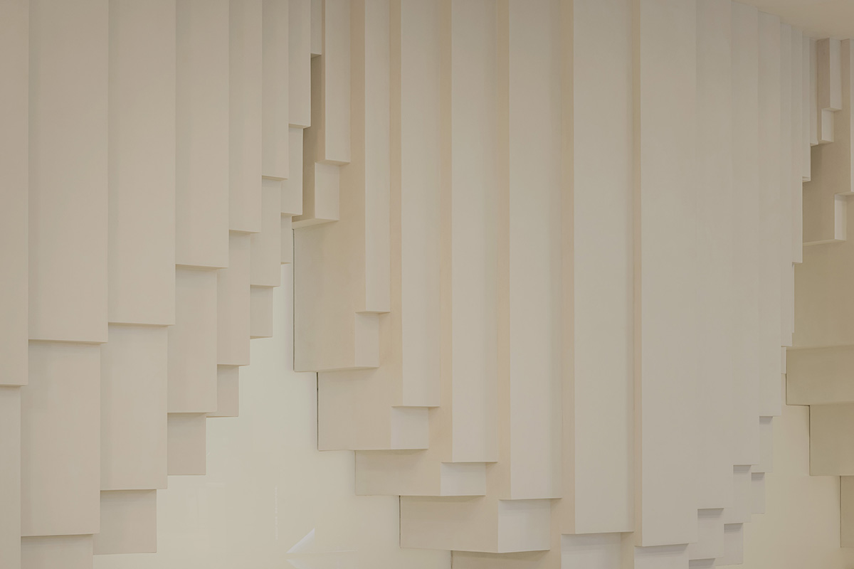 Simple Cuisine Gallery mimics waterfalls, with flowing facades that evoke water movement in China 