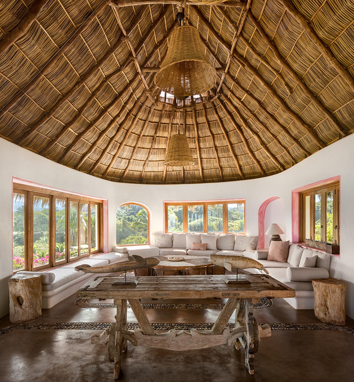 MAIN OFFICE adds half-circle yoga platform to thatched-roof guest villas in Sayulita, Mexico