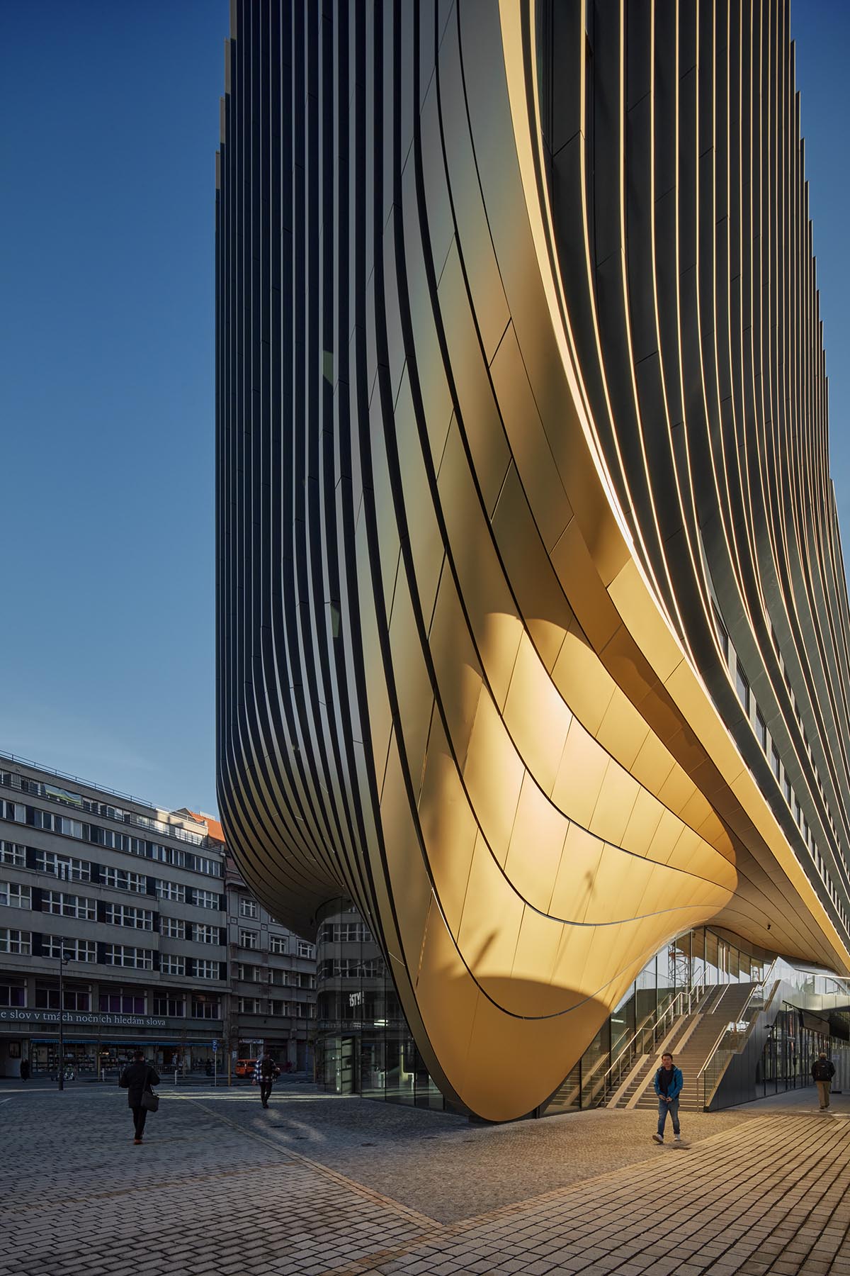 Zaha Hadid Architects completes Masaryčka building with golden vertical fins in Prague