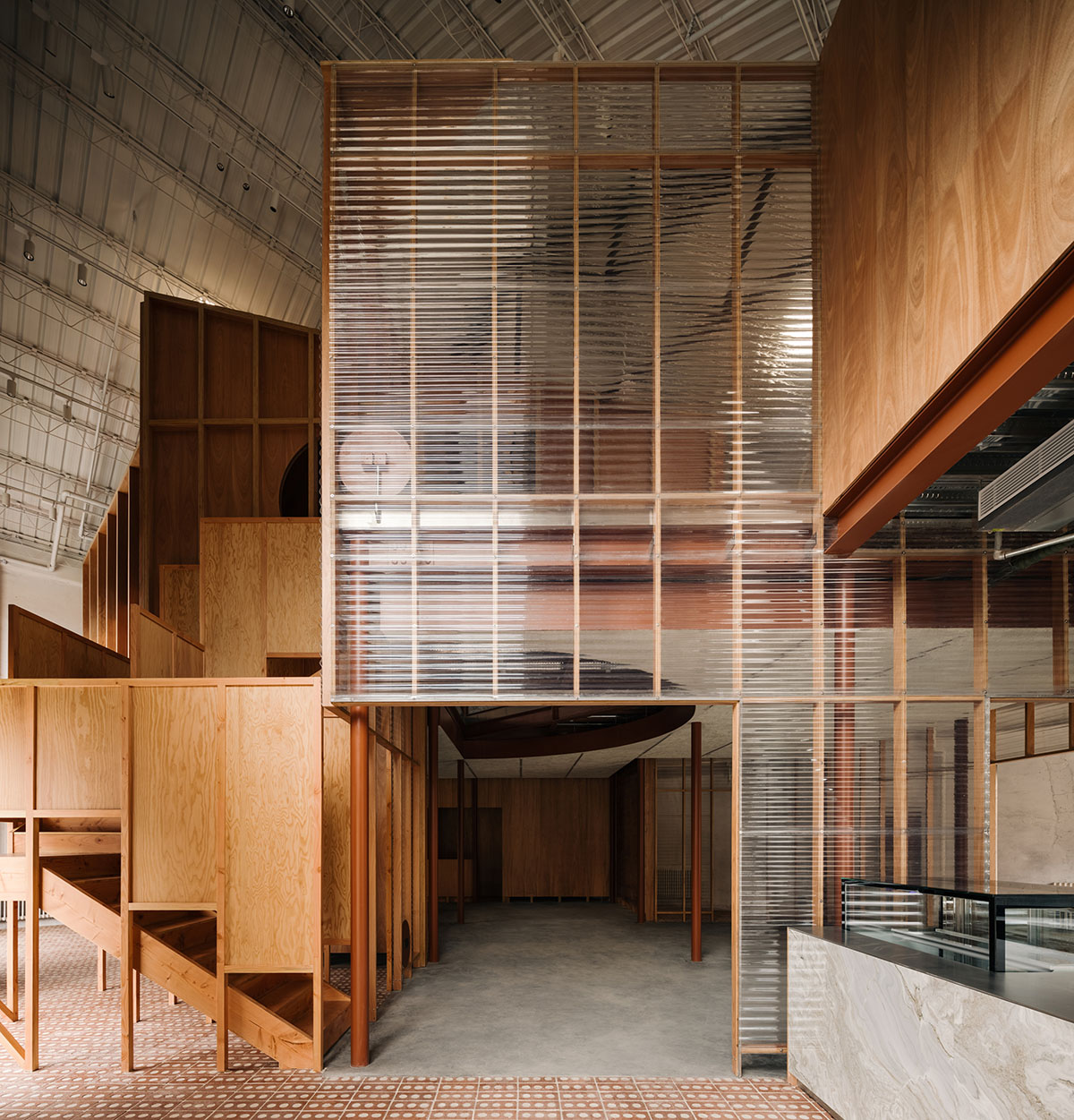 Atelier tao+c creates a crystal-like showroom with two stacked timber volumes in Beijing 